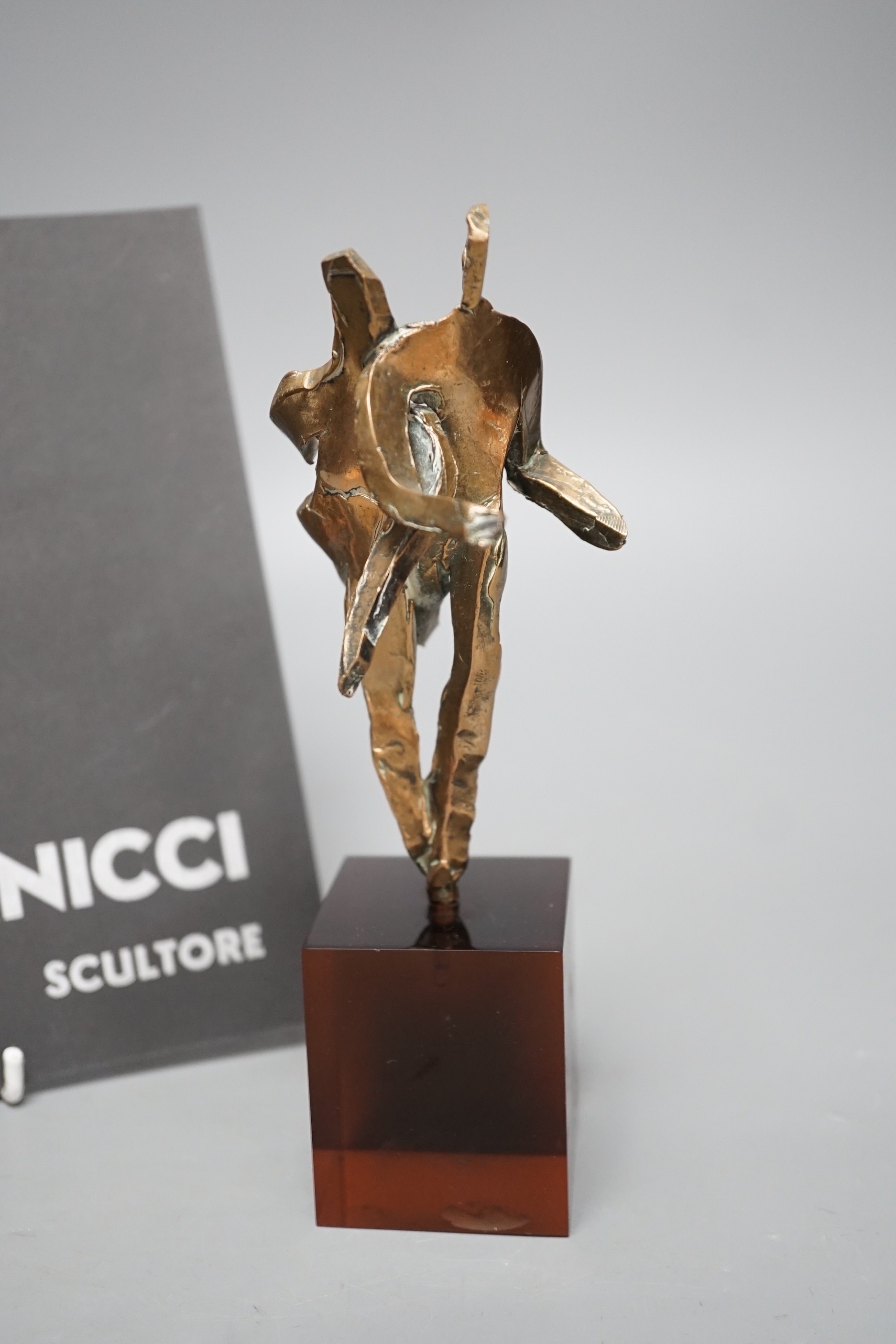 Emanuele Scarnicci (b.1916-?), a cast bronze abstract figure, with exhibition catalogues, 20cm